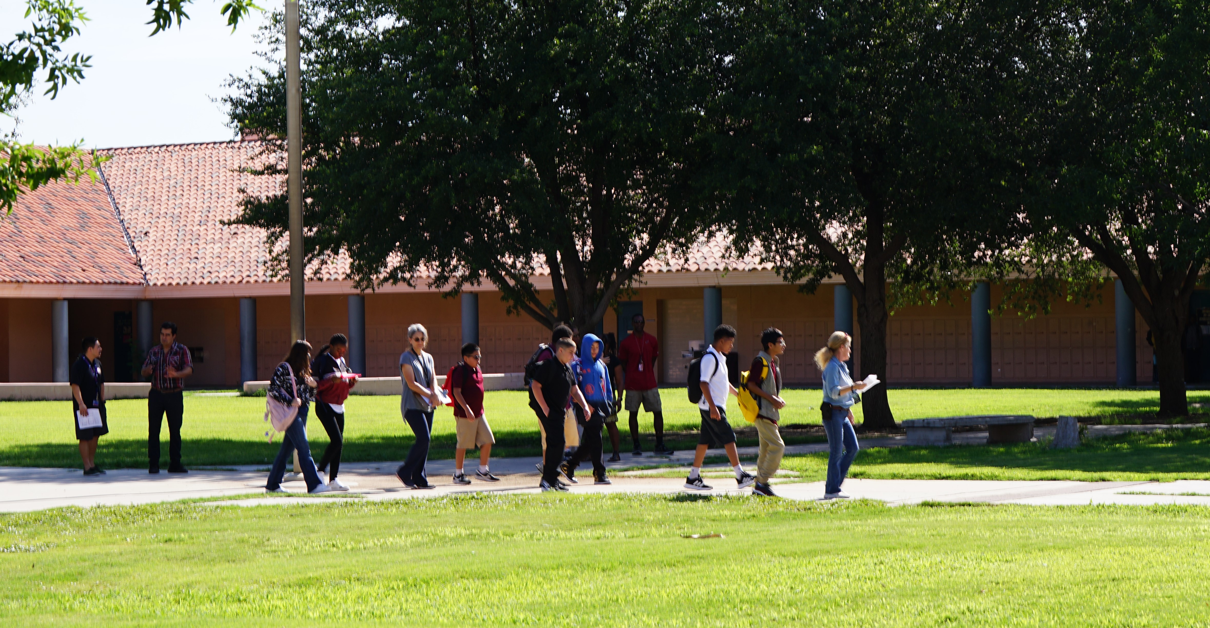 Students walk outside of Doolen on the first day